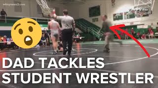 Dad tackles wrestler at high school match