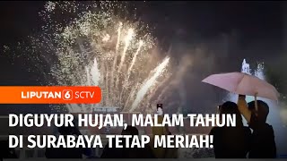 Malam Tahun Baru di Surabaya Diwarnai Hujan, Antusias Warga Tak Berkurang | Liputan 6