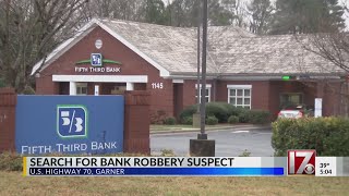 Search for bank robbery suspect in Garner