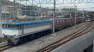 熊本駅周辺の立体駐車場で撮った貨物列車4093レです。牽引機関車はEF81 454です。手が映ってます。