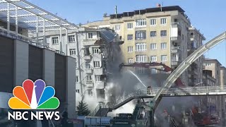 Building collapses during demolition after deadly earthquake in Turkey