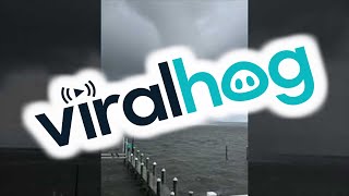 Massive Waterspout Forms Near House || ViralHog