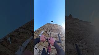 crazy kiter climbing on a tower!