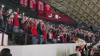 Georgia students flash their phone lights to cheer on Bulldogs