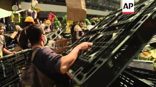 Police arrested key student leaders of Hong Kong's pro-democracy protests Wednesday as they cleared