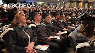 A new MUN president, and almost a thousand new graduates, take the stage