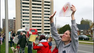 Boisterous crowd cheers on hard-hit Carlingview Manor residents and staff