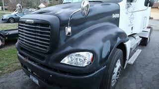 Replacing a hood, 2007 Freightliner Columbia.