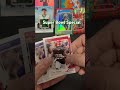 opening a pack of football cards for the super bowl