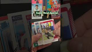 Opening a pack of football cards for the Super Bowl