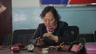 山西女矿工三十几年时间，维修几十万盏矿灯，为矿工点亮安全之路