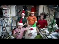 christmas in space astronauts share festive cheer from the international space station aq1g