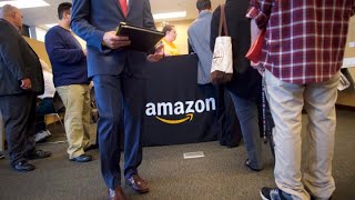 Job seekers line up to fill a variety of Amazon positions