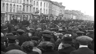 Belgian cavalry riding through streets of town in Flanders, Belgium in World War ...HD Stock Footage