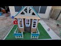 kidkraft lakeside bungalow playhouse setup