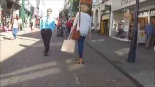 Walking on Week Street, Maidstone, Kent, UK  on a hot summers day, Saturday 16th August 2014