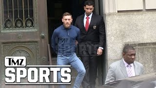 Conor McGregor Leaves Police Station In Handcuffs | TMZ Sports