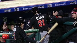 MIA@PHI: Ozuna scores Yelich with single to center