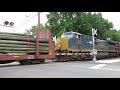 long mixed freight train with five engines including a dpu on the csx river line