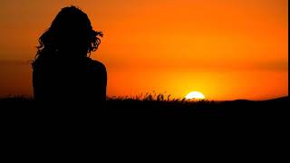 sunset sad girl sitting alone 4k video