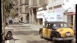 Late 1950s/ early 1960s Barcelona, Fancy Hotel Entrance, Taxi Pulls Away