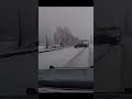 Watch: Truck spins out in front of state trooper on snowy road in King County, Washington