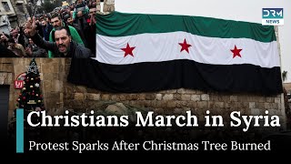 Syria’s Christians March in Protest After Christmas Tree is Burned by Extremists | AQ1G