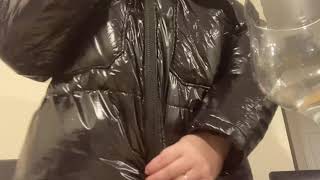 Zipping and unzipping women’s bohoo puffer jacket