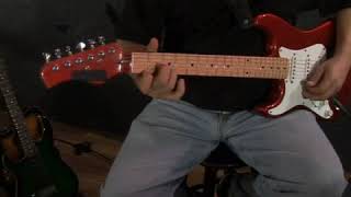 How to Play a D Minor Chord on a Left Handed Guitar