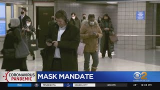Some commuters shed their masks for morning rush