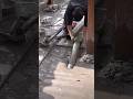 The process of cutting a large diameter hole at an angle in a concrete floor