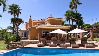 Luxury 4 bed villa with pool in Caramujeira, Carvoeiro for sale in lush gardens and sea views