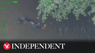 Atlanta police officers swim after fleeing suspect, arrest him in lake