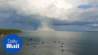 Huge 'atomic bomb' cloud forms over a lake in Hungary