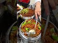 a 12 yuan lunch box on the streets of northeast china is a big sticky and solid bowl. northeast