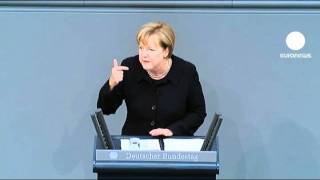 Merkel defends budgetary record over euro crisis