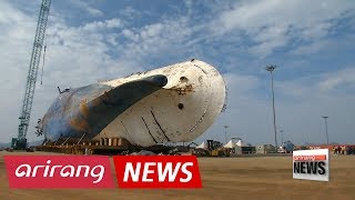 Search team to set Sewol-ho Ferry upright to look for remaining bones