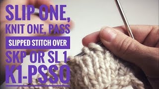 Slip one, knit one, pass slipped stitch over - skp - sl 1-K1-psso