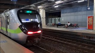 1234次竹南發車經由西部幹線開往基隆的銀綠色微笑號EMU900型十輛一編組EMU930區間車