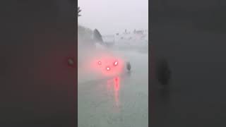 Carlos Sainz's Ferrari in heavy rain at the end of P2 of the Formula 1 Canadian Grand Prix