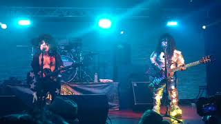 Mini KISS performing Strutter