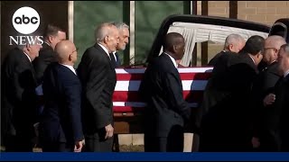 Former President Jimmy Carter's casket is transferred to Atlanta