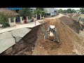 wow dozer cutting slope cleaning sidewalk road widening u0026 resurfacing hillside canal road