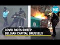 Watch: Brussels on edge as thousands clash with police over new covid rules amid infection surge