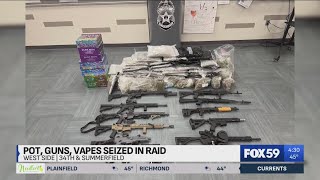 IMPD: 14 guns, nearly 50 pounds of marijuana seized after search leads to arrest