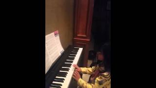 Laila playing carnatic on piano