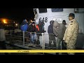 1 400 migrants rescued at sea 2 bodies recovered italian coastguard