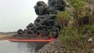 Fire on river. Burhi Dihing river caught fire at Naharkatia, Assam,