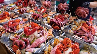 Lezzetli deniz ürünleri yemekleri, sashimi, kral yengeç, ızgara istiridye | Kore