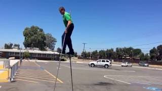 Rodger Monette walking on stilts with the greatest of ease